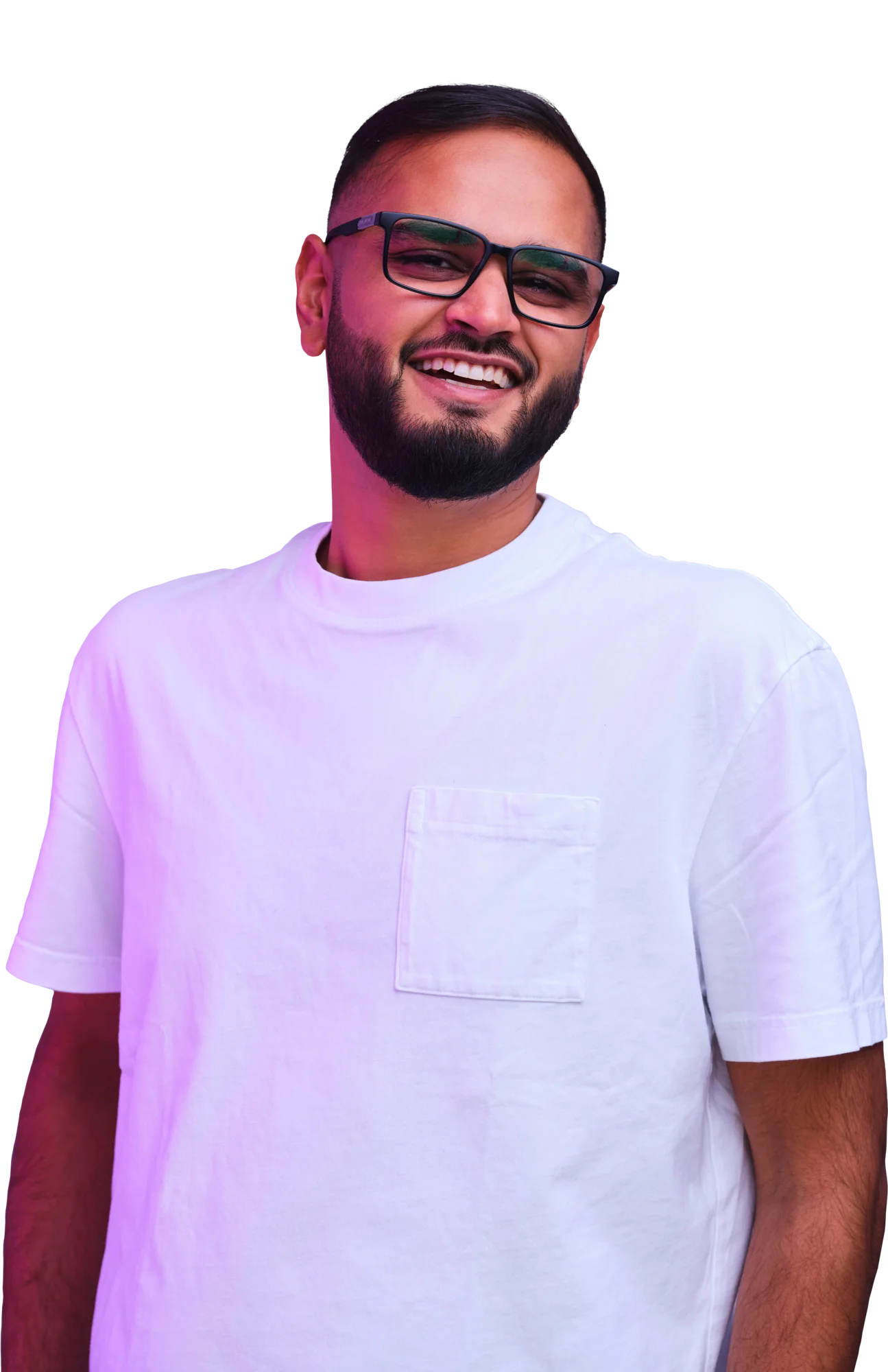 Smiling man with a beard wearing a white T-shirt and sunglasses against a dark background.