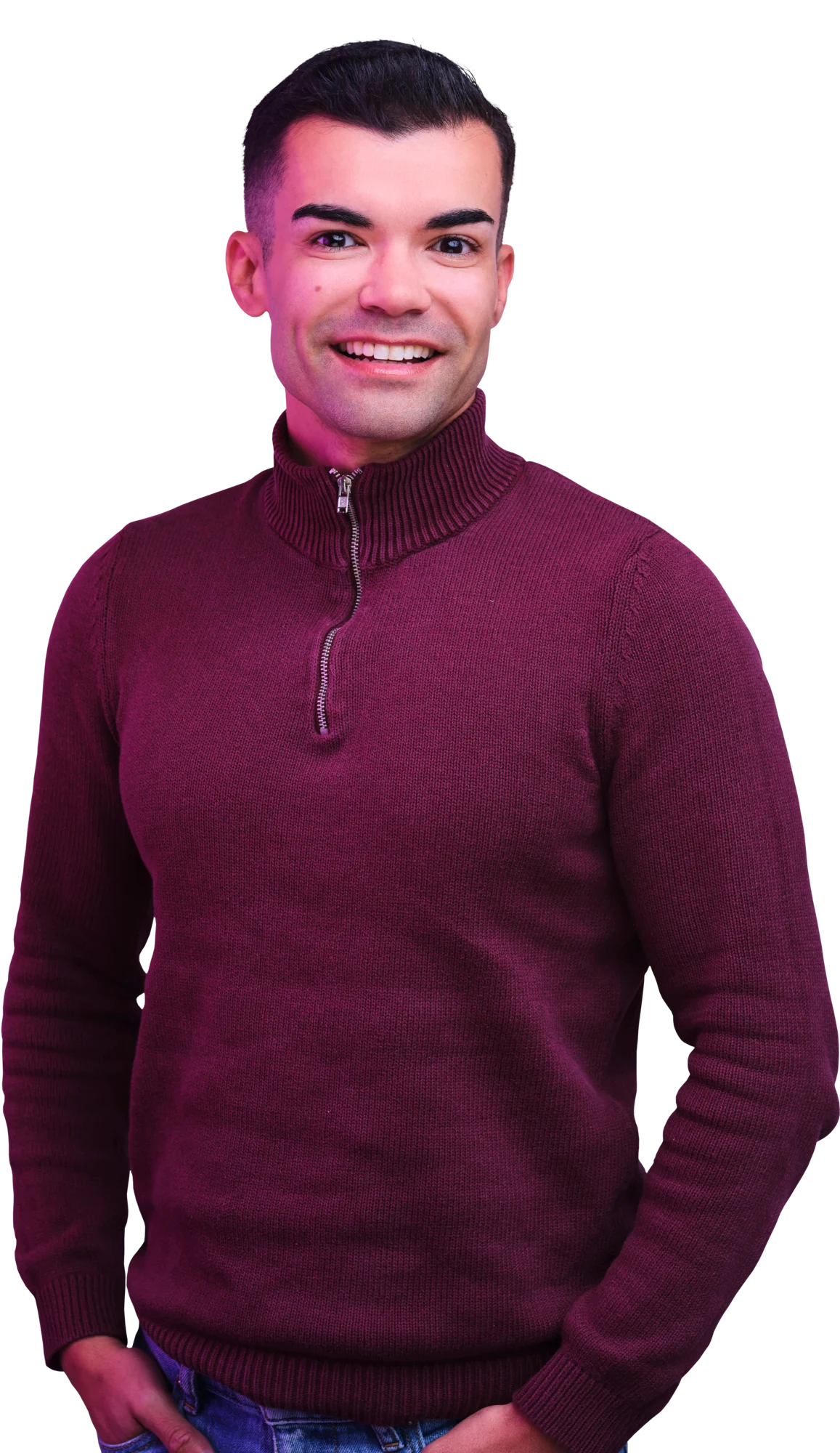 Smiling man wearing a maroon zip-neck sweater against a black background.